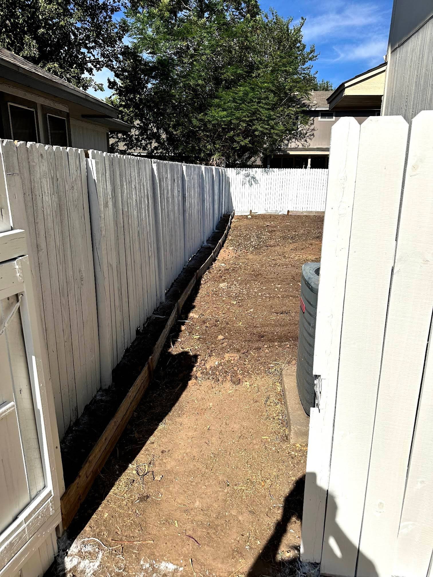New backyard fence from reclaimed pickets!